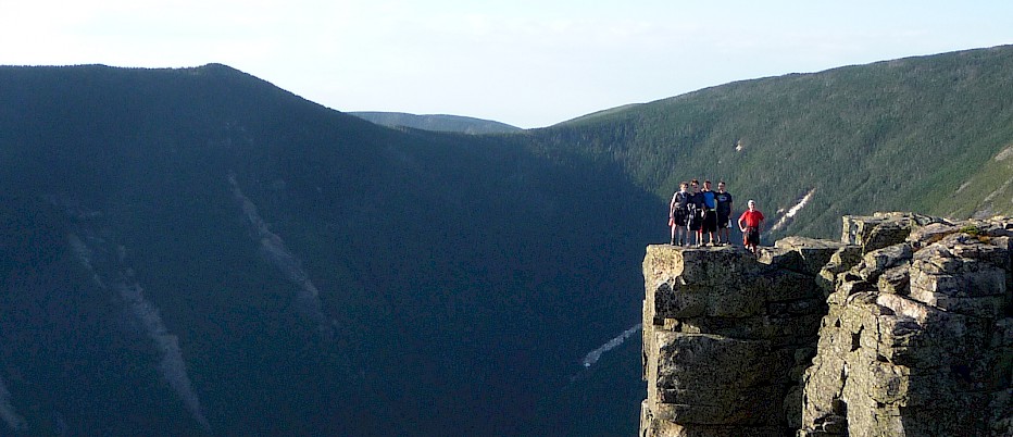 Many of our most incredible camp adventures take place on trip.  Any of these campers will tell you - the fact that they were able to pose for this photo on Bond Cliff was absolutely worth the effort it took to get there!