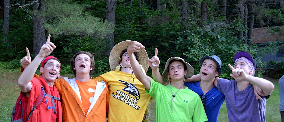 Depicting all the colors of the rainbow, CITs prepare to serve food at one of our weekly cookouts.  Although they all hope to earn counselor positions for the following summer, the real "pot of gold" at the end of this rainbow are the lifelong friendships developed after years together at camp.