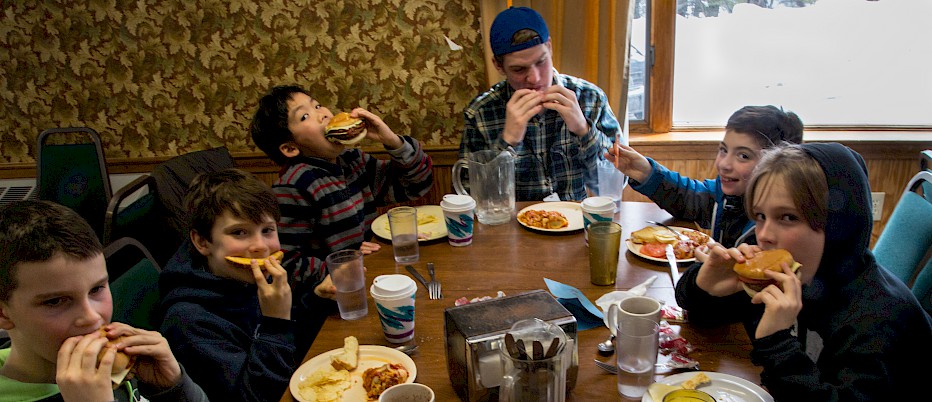 Lunch at camp is at 12:30PM, followed by Rest Hour between 1:00PM - 2:00PM.  Afternoon lessons run between 2:30PM - 4:00PM.  After lessons we enjoy Free Ski time or an alternative Fun Activity before coming back inside for dinner.